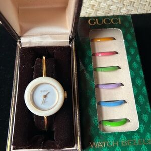 Gucci 1990’ bangle  watch with interchanging bezels. No battery needed